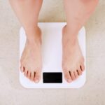 Person Standing On White Digital Bathroom Scale 8.jpg