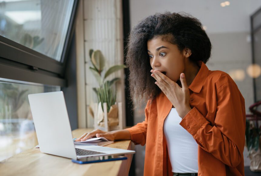 Surprised Young Woman Laptop.jpg